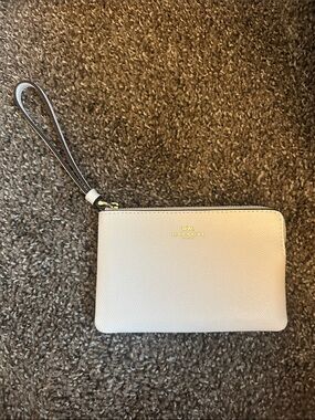Off white coach wristlet